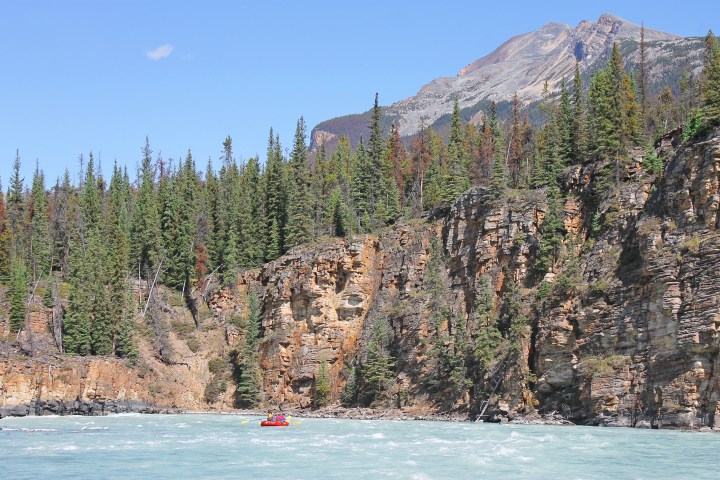 a canyon with a mountain in the background