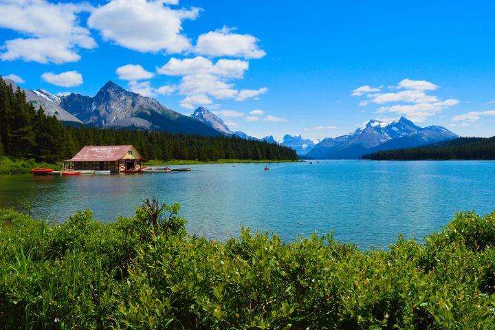 a body of water with a mountain in the background