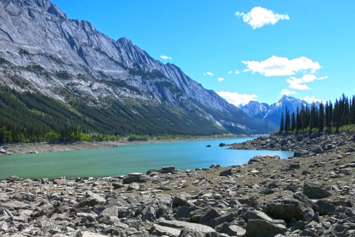 a beach with a mountain in the background