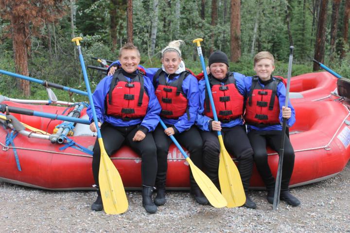 a group of people posing for the camera