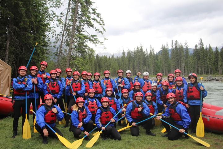 a group of people posing for the camera