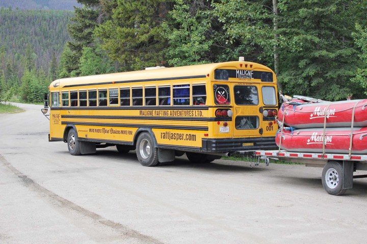 a school bus that is driving down the road