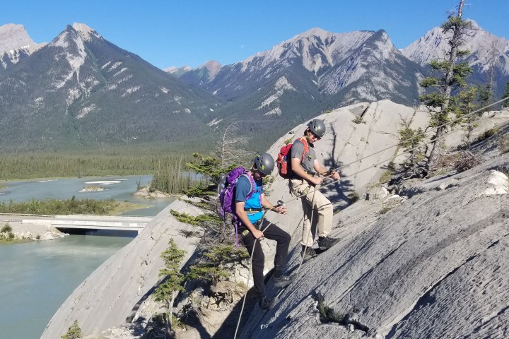 a man riding on top of a mountain